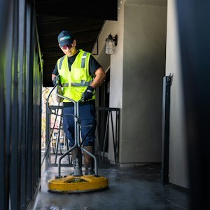 Pressure washing worker in safety vest - Risk Assessment